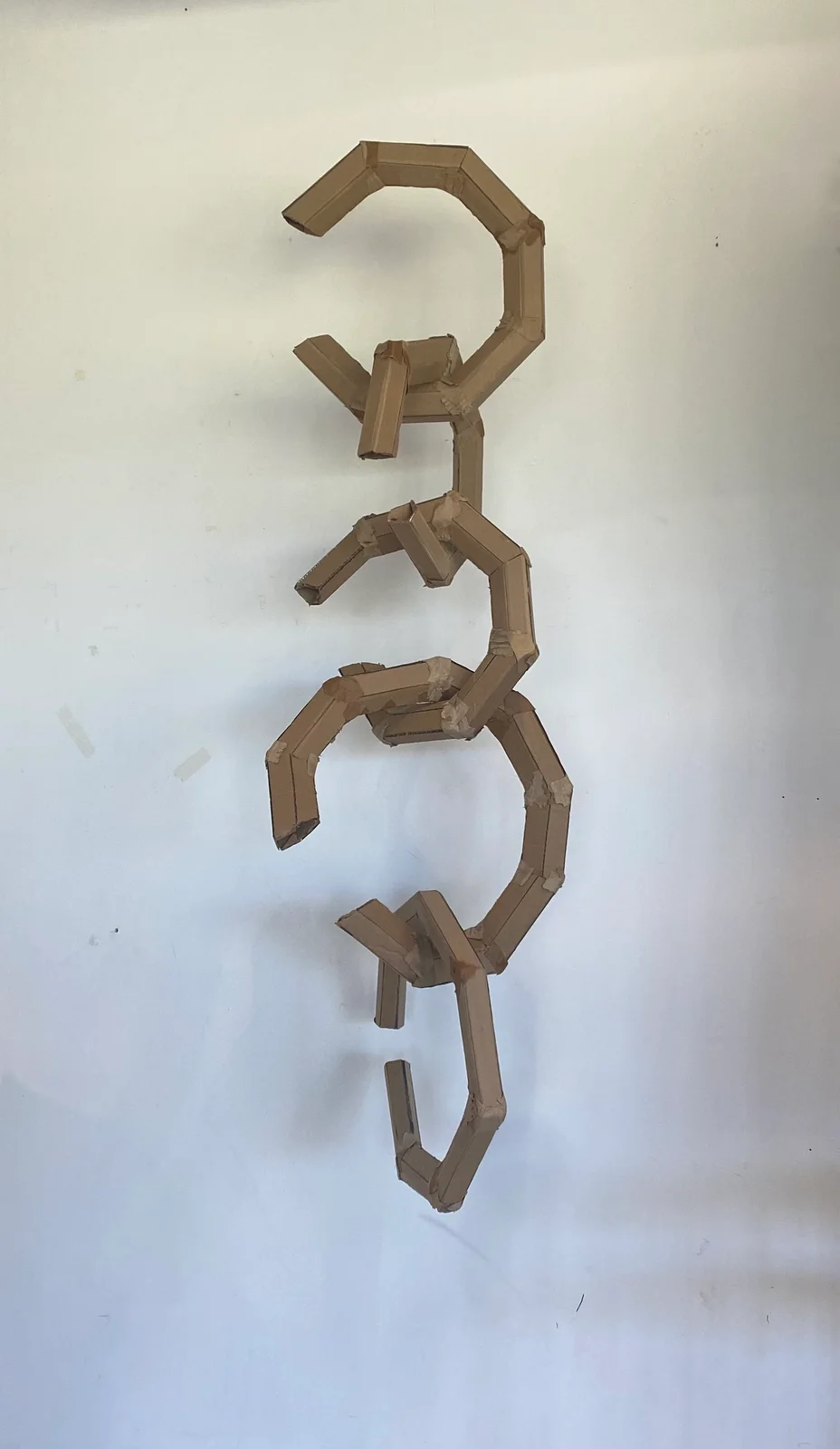 Hanging geometric wooden sculpture