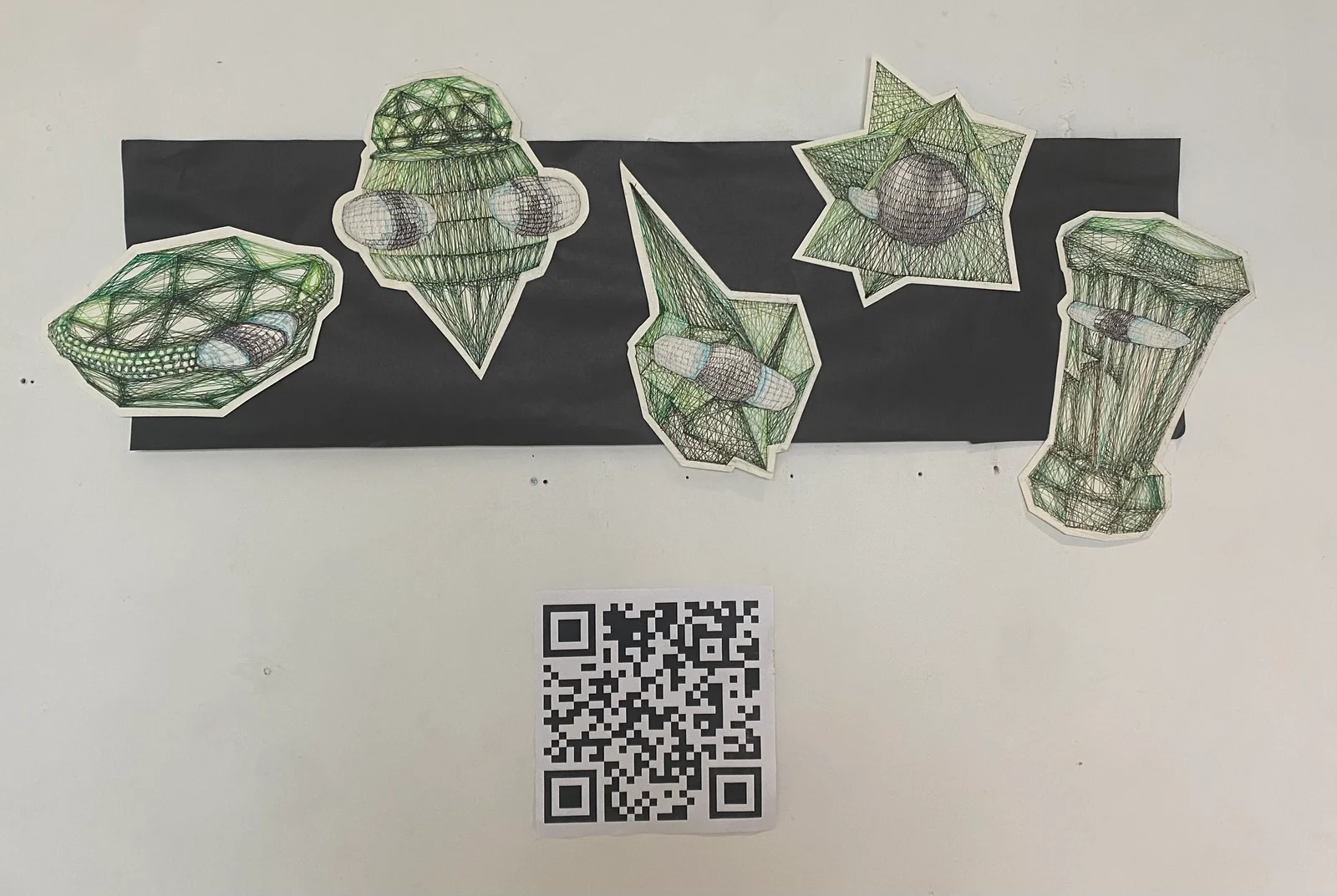 Green illustrated objects arranged on a wall