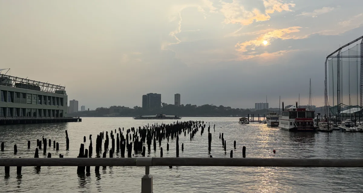 Sunset over a waterfront marina